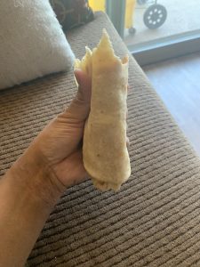 Bean & Cheese Burrito with refried beans and melted cheese at La Lomita Mexican Grill. Feel free to modify any details as needed!