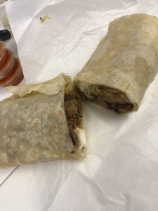 California Burrito with grilled steak, French fries, and cheese at La Lomita Mexican Grill. Feel free to modify any details as needed!