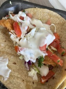 Fish Taco with grilled fish, cabbage, and pico de gallo at La Lomita Mexican Grill. Feel free to modify any part as needed!